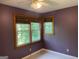 This bedroom features natural light with windows and is painted with neutral colors at 823 Mountain View Run, Stone Mountain, GA 30087