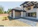 Well-designed backyard patio with sleek lines and attractive hardscape elements at 105 Robinwood Ct, Fayetteville, GA 30214