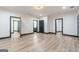 Spacious basement with wood floor, recessed lighting, and multiple doorways leading to other rooms at 105 Robinwood Ct, Fayetteville, GA 30214