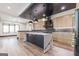 Modern kitchen with an island, custom cabinetry, and stainless steel appliances at 105 Robinwood Ct, Fayetteville, GA 30214