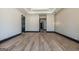 Spacious living room with modern hardwood floors, black trim and decorative wall accents at 105 Robinwood Ct, Fayetteville, GA 30214