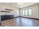 Open room featuring a bar, recessed lighting, and natural light from windows at 105 Robinwood Ct, Fayetteville, GA 30214