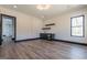 Spacious room with a bar area and a window with natural light at 105 Robinwood Ct, Fayetteville, GA 30214