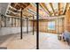Unfinished basement with exposed ceiling and support beams, awaiting customization at 345 Sharon Dr, Fayetteville, GA 30214