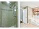 Bathroom featuring tiled shower, soaking tub, neutral color palette, and white fixtures at 345 Sharon Dr, Fayetteville, GA 30214