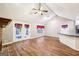 Open-concept living space with vaulted ceiling, hardwood floors, and ample natural light at 345 Sharon Dr, Fayetteville, GA 30214