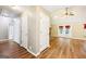 Spacious living area featuring vaulted ceilings, hardwood floors, and a brick fireplace at 345 Sharon Dr, Fayetteville, GA 30214
