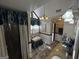 Bathroom with granite counters, triangle window and decorative accents at 3970 Governors Cir, Loganville, GA 30052