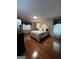 Primary bedroom with hardwood floors and natural light at 3970 Governors Cir, Loganville, GA 30052