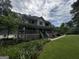Charming two-story home with a full wrap-around porch and lush landscaping at 3970 Governors Cir, Loganville, GA 30052