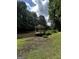 Waterfront gazebo offers peaceful views of the surrounding nature and lake at 3970 Governors Cir, Loganville, GA 30052