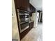 Modern kitchen features stainless steel appliances including double oven and microwave at 3970 Governors Cir, Loganville, GA 30052