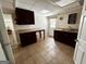 Basement kitchenette offers a convenient space for preparing snacks or beverages at 3970 Governors Cir, Loganville, GA 30052