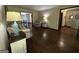 Cozy living room with hardwood floors, neutral paint and ample natural light at 3970 Governors Cir, Loganville, GA 30052