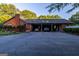 Large carport with parking space for two cars at 8815 Campbellton St, Douglasville, GA 30134