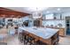 Bright open kitchen with a large island with seating, modern appliances, and a seamless connection to living area at 8815 Campbellton St, Douglasville, GA 30134