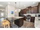 Modern kitchen featuring stainless steel appliances, granite countertops, and stylish cabinetry at 2277 Church St, Hampton, GA 30228