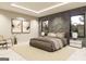 This spacious primary bedroom has a neutral color scheme, modern minimalist furniture, and two large windows at 3181 Buck Branch Rd, Conyers, GA 30094