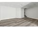 Spacious basement with neutral walls and durable flooring, presenting endless opportunities for finishing and expansion at 5368 Nw Stafford Nw Dr, Lilburn, GA 30047