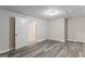 Spacious basement area with modern flooring and freshly painted walls at 5368 Nw Stafford Nw Dr, Lilburn, GA 30047