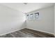 Bright bedroom featuring new floors, neutral paint, and windows offering serene views of the outdoors at 5368 Nw Stafford Nw Dr, Lilburn, GA 30047