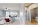 Hallway view to comfortable seating area and a well-equipped laundry room at 104 Conway St, Peachtree City, GA 30269