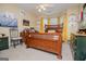 Bedroom with a double bed, a ceiling fan, carpet and yellow walls and drapes at 204 Pinehurst Way, Carrollton, GA 30116