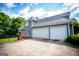 Two car garage with large driveway is adjacent to the home at 204 Pinehurst Way, Carrollton, GA 30116
