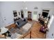 Bright and open living room with soaring ceilings, a fireplace, and lots of natural light at 204 Pinehurst Way, Carrollton, GA 30116