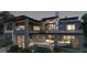 Contemporary home features an outdoor patio, balconies, large windows, and modern outdoor lighting at 3935 Jailette, Atlanta, GA 30331