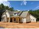 Lovely two story home featuring an elegant exterior with a covered porch and attractive architectural details at 4 Bob Smith Rd, Sharpsburg, GA 30277