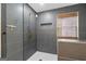 Modern shower features gray subway tile, built in shelf, and gold hardware at 500 Happy Hollow Rd, Villa Rica, GA 30180