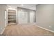 Finished basement with built-in shelves and closet space at 56 American Walk, Peachtree City, GA 30269