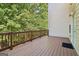 Spacious deck offers outdoor living with beautiful views of mature trees at 56 American Walk, Peachtree City, GA 30269