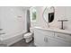 Bathroom featuring vanity, combination tub/shower and tile at 32 Walthall Ne St # A, Atlanta, GA 30307