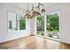 Bright dining room features a contemporary chandelier and large windows that provide lots of natural light at 32 Walthall Ne St # A, Atlanta, GA 30307