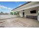 Spacious outdoor living space with a built-in kitchen area and a mounted television for entertaining at 32 Walthall Ne St # A, Atlanta, GA 30307