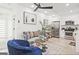 Bright living room with modern furnishings and decor, open to kitchen with stainless steel appliances at 3229 Kingsdale Dr # 2, Atlanta, GA 30311