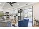 Living room open to modern kitchen, with access to outdoor patio area at 3229 Kingsdale Dr # 2, Atlanta, GA 30311
