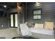 Covered patio with hanging bed swing, ceiling fan, and outdoor seating at 3229 Kingsdale Dr # 2, Atlanta, GA 30311