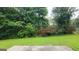 Scenic backyard of a home, backing up to wooded area for privacy at 5502 Sapphire Cir, Ellenwood, GA 30294