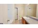 Bathroom with spacious vanity and combined bathtub shower at 5502 Sapphire Cir, Ellenwood, GA 30294
