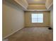 Neutral bedroom with tray ceiling and natural light at 5502 Sapphire Cir, Ellenwood, GA 30294