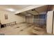 A spacious two car garage with painted walls and concrete floors at 5502 Sapphire Cir, Ellenwood, GA 30294