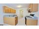 Kitchen featuring laminate countertops, matching appliances, and plenty of storage at 5502 Sapphire Cir, Ellenwood, GA 30294