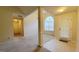 Spacious living room area featuring a large window and open layout at 5502 Sapphire Cir, Ellenwood, GA 30294