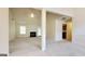 Expansive open-concept living room featuring a fireplace and neutral carpeting at 5502 Sapphire Cir, Ellenwood, GA 30294