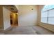 Living space with arch window and open-concept design; great for entertaining at 5502 Sapphire Cir, Ellenwood, GA 30294