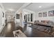 Bright, open-concept interior showcases hardwood floors, neutral walls, and stylish furnishings connecting the living and dining areas at 3711 Wartrace Dr, South Fulton, GA 30331