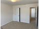 Bedroom featuring carpet flooring and a closet at 1238 Polk Xing, Mcdonough, GA 30252